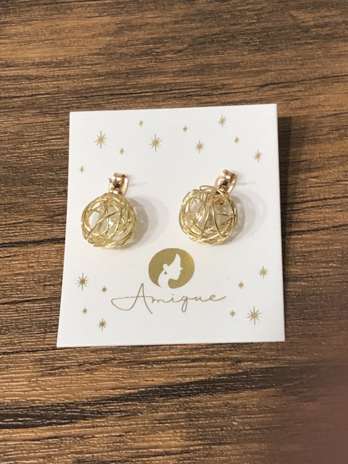 ピアスストアAmique ロゴ